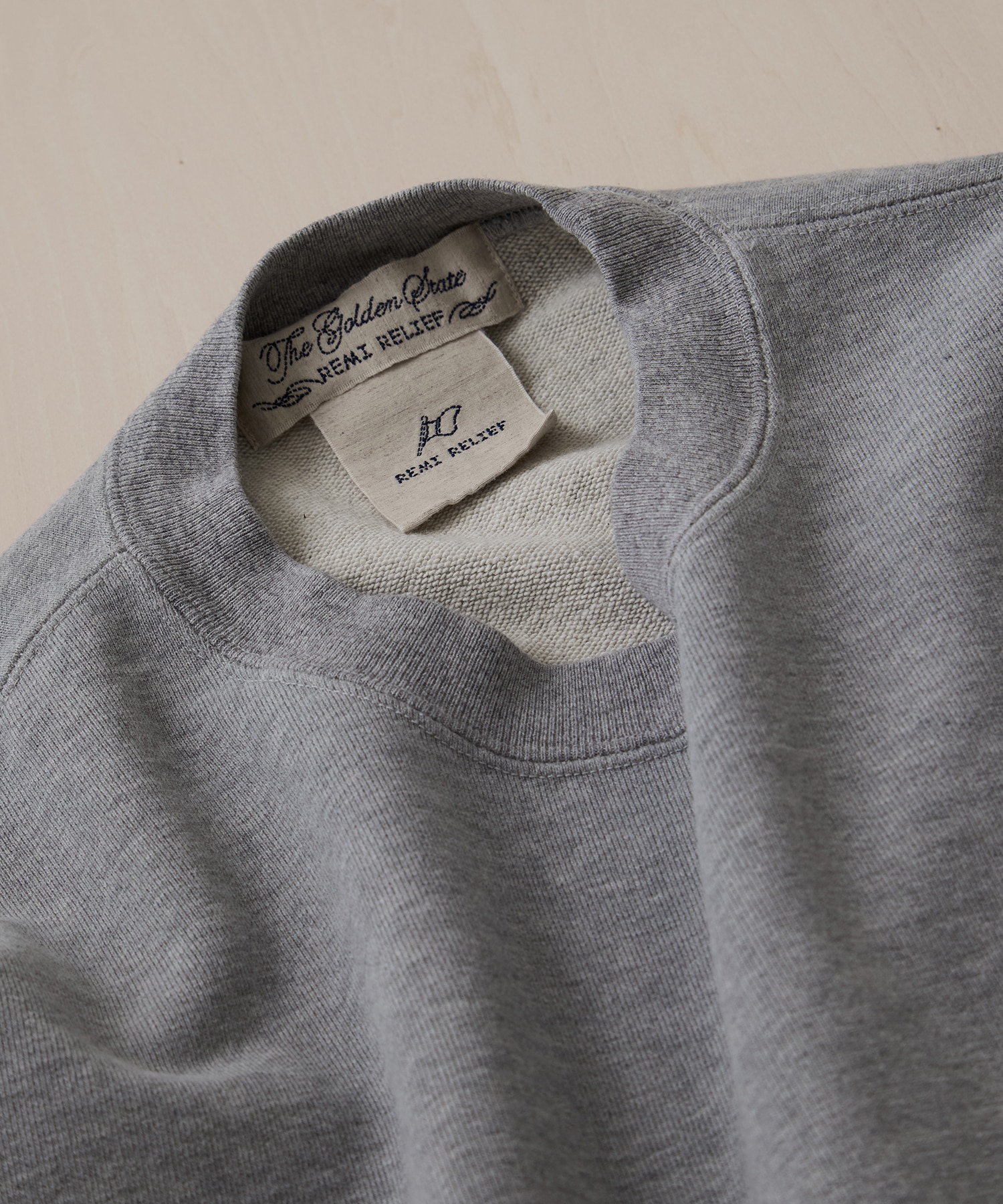 SP加工裏毛BIGサイズクルー REMI RELIEF