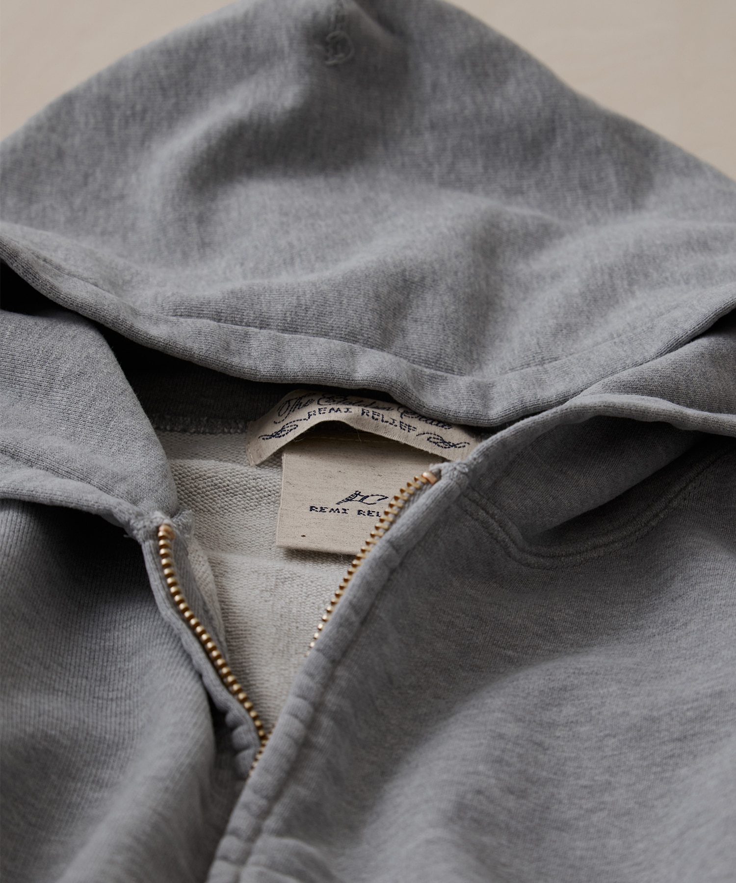 SP加工裏毛ZIPパーカー New Fit REMI RELIEF