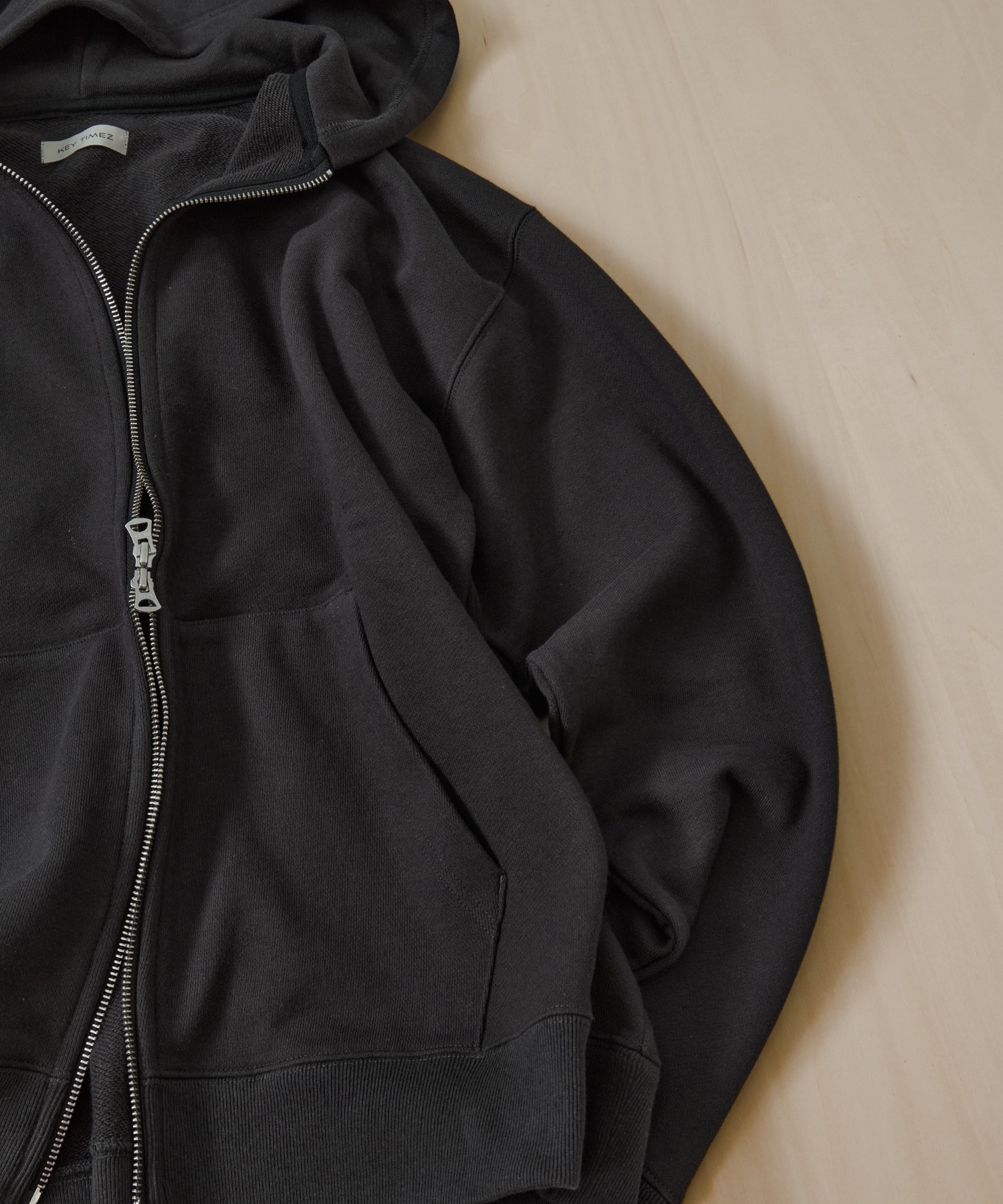 コンパクトループFテリーZipフーディー KEY TIMEZ
