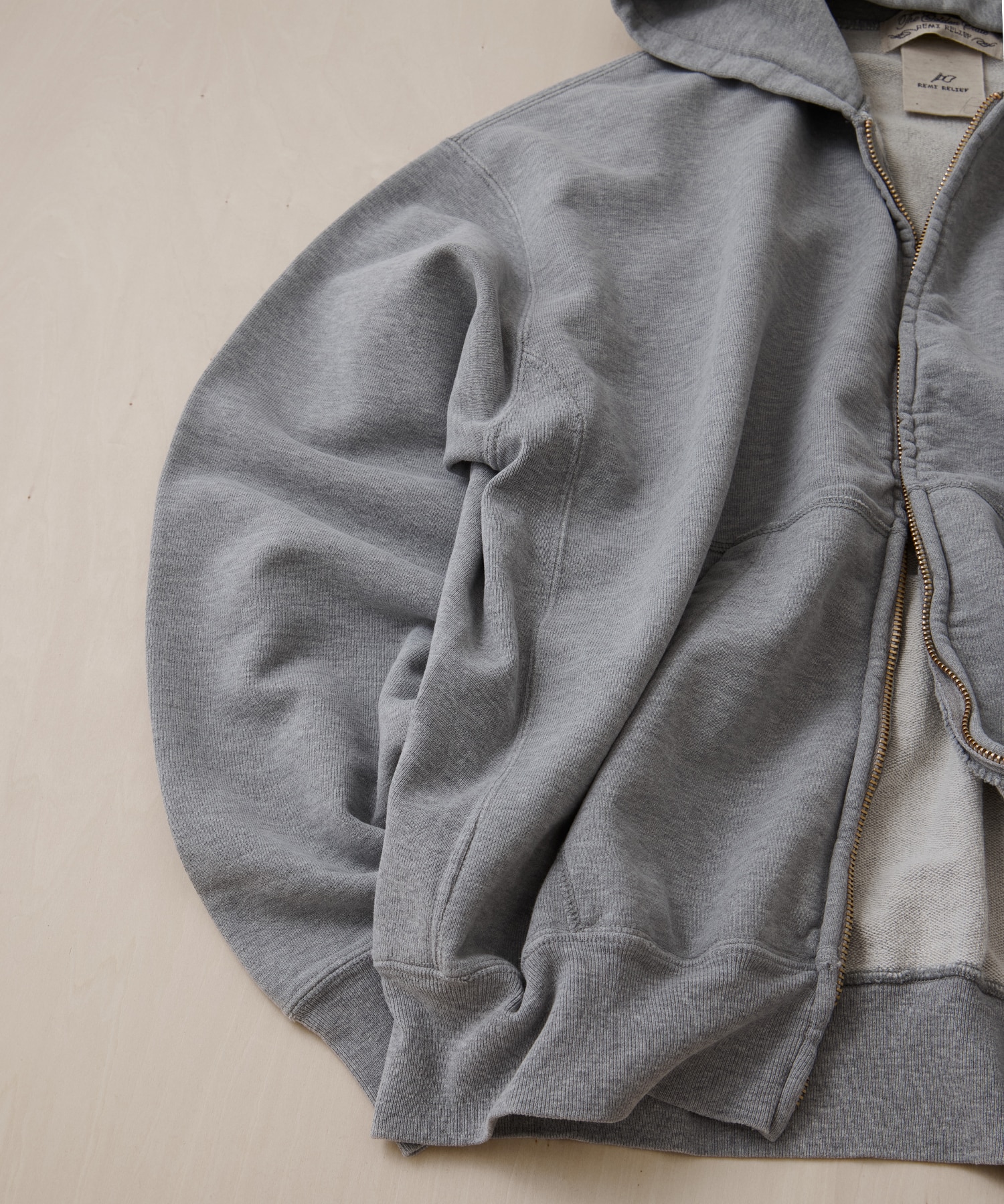 SP加工裏毛ZIPパーカー New Fit REMI RELIEF