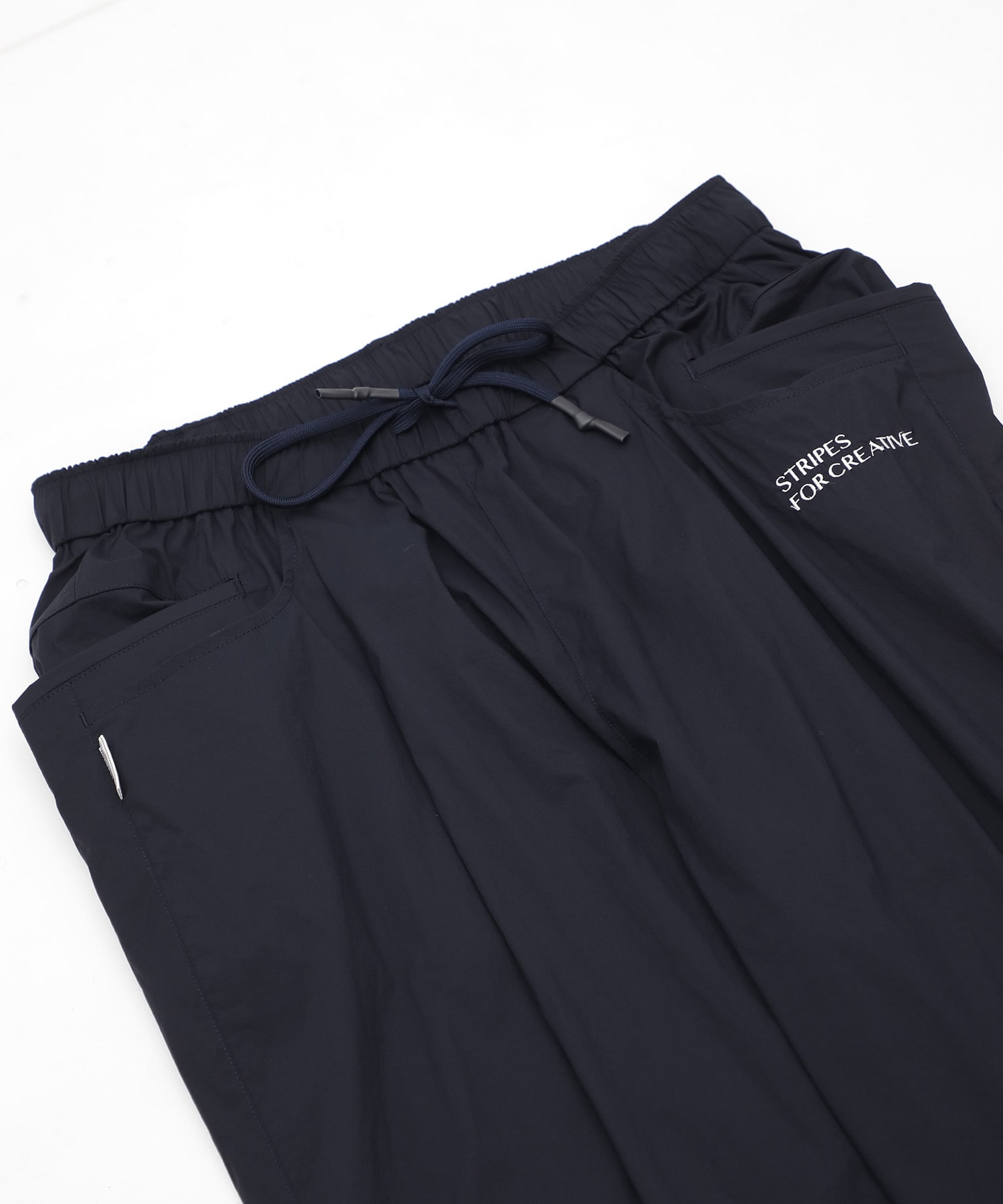 WIDE TAPERED EASY PANTS (NYLON) S.F.C