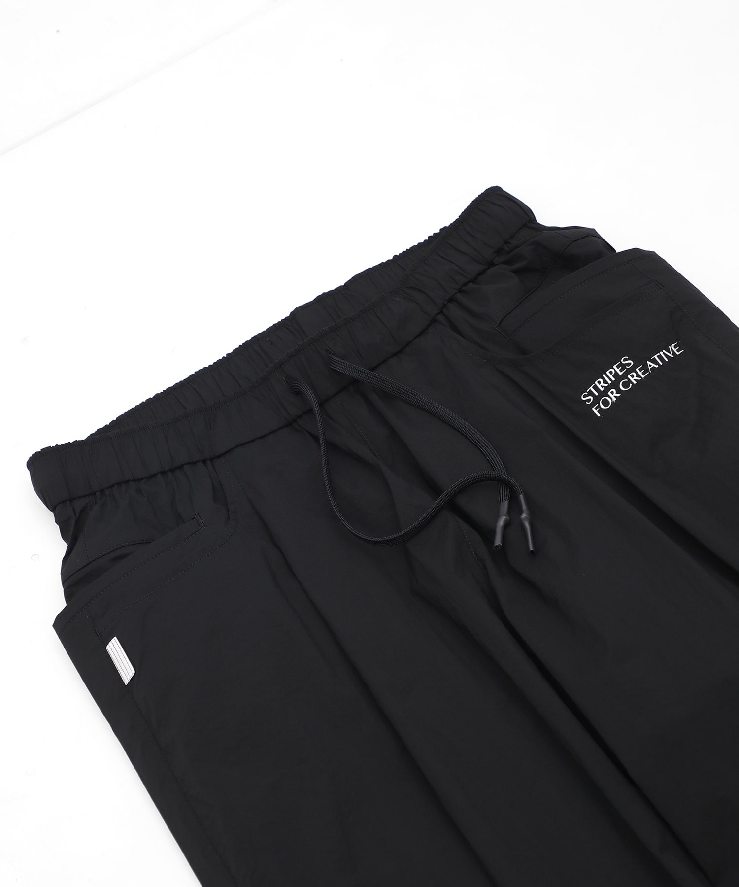 WIDE TAPERED EASY PANTS (NYLON) S.F.C