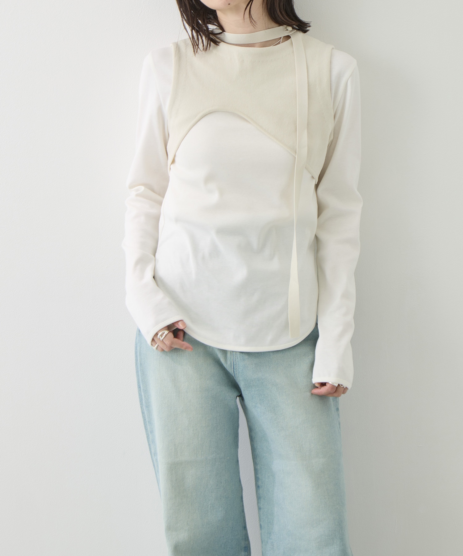 CURVED HEM KNIT TOPS